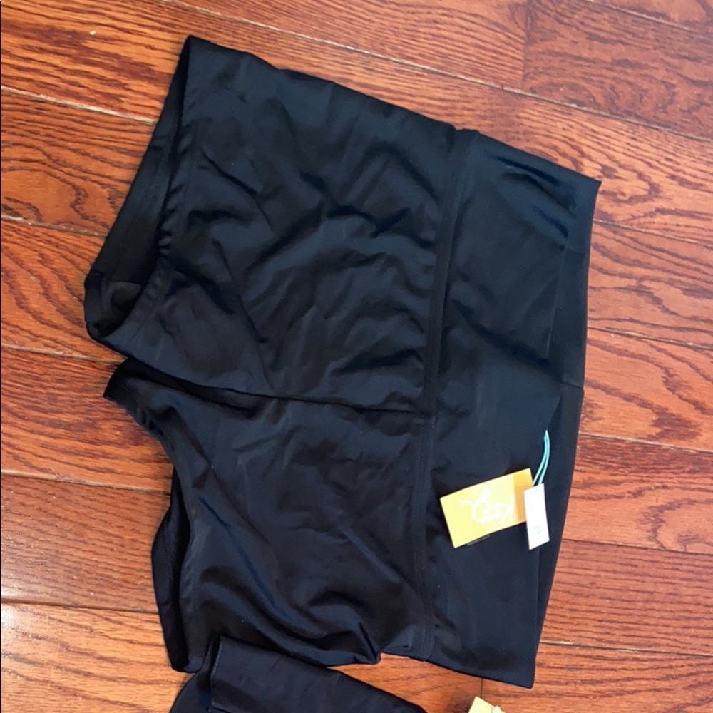 Kona Sol swim shorts and skirt